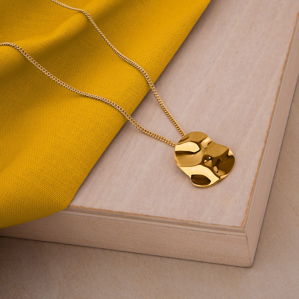 Republic Road Mirer Marvel Necklace in Gold on Wood 