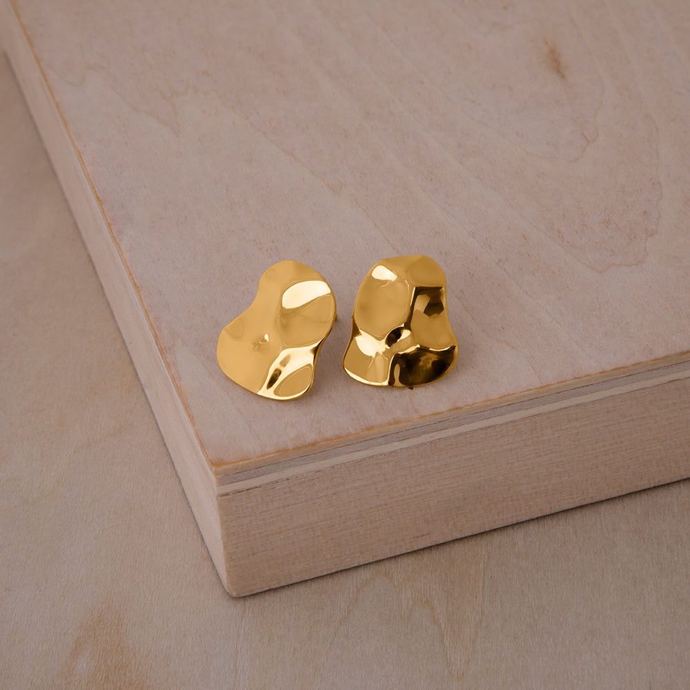 Republic Road Mirer Marvel Studs Gold on wood 