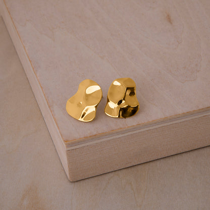 Republic Road Mirer Marvel Studs Gold on wood 